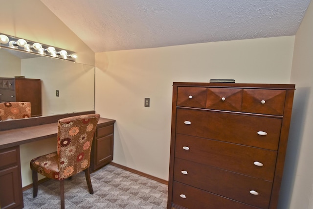 122 Mcmichaels Ct, Stroudsburg, PA 18360 - office area with vaulted ceiling, a textured ceiling, and built in study area