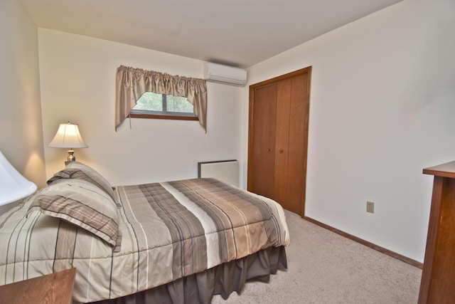 122 Mcmichaels Ct, Stroudsburg, PA 18360 - bedroom featuring a wall mounted air conditioner, carpet floors, and a closet