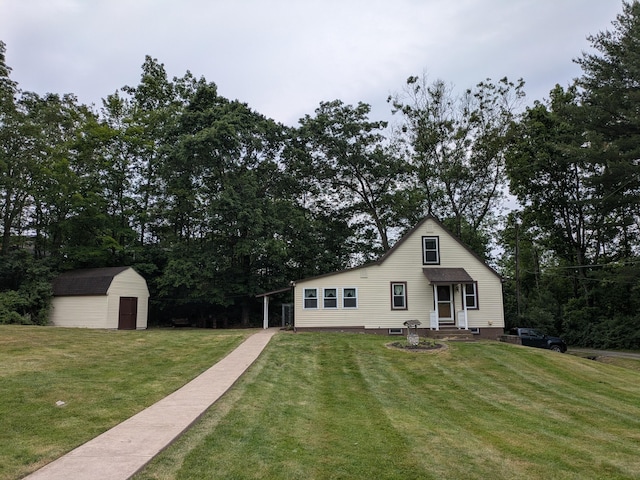124 Sterling Valley Rd, Kunkletown, PA 18058 - back of house featuring a shed, a yard, and view of wooded area