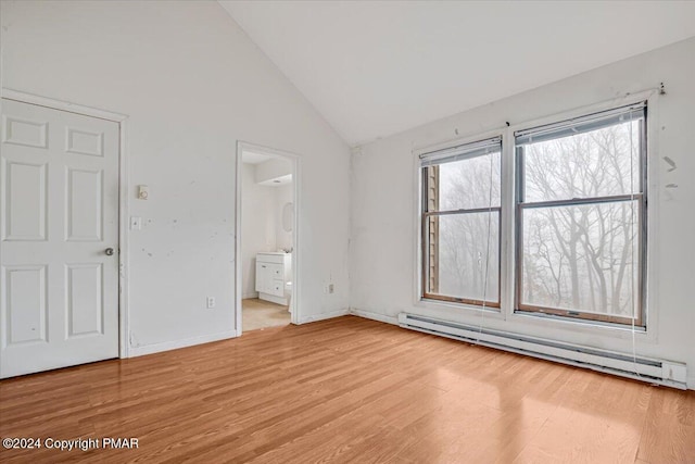 unfurnished bedroom with light wood-type flooring, high vaulted ceiling, a baseboard radiator, and baseboards