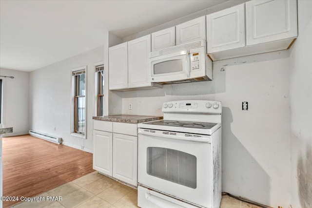 kitchen with a baseboard heating unit, white appliances, light tile patterned floors, and white cabinets