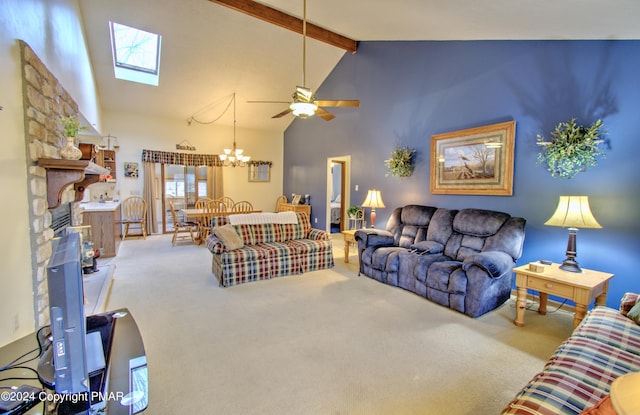 living area with carpet, high vaulted ceiling, beam ceiling, and ceiling fan with notable chandelier