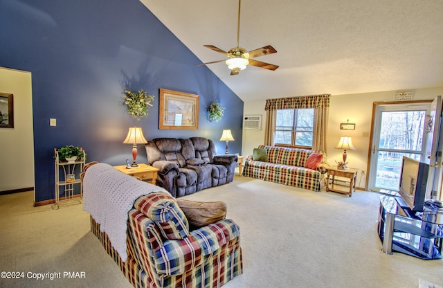 living area featuring ceiling fan, baseboards, a wealth of natural light, and carpet flooring