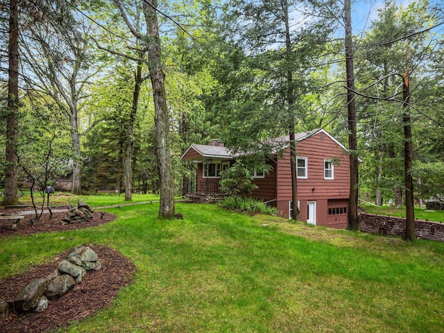 505 Moseywood Rd, Lake Harmony, PA 18624 - view of grassy yard featuring an attached garage