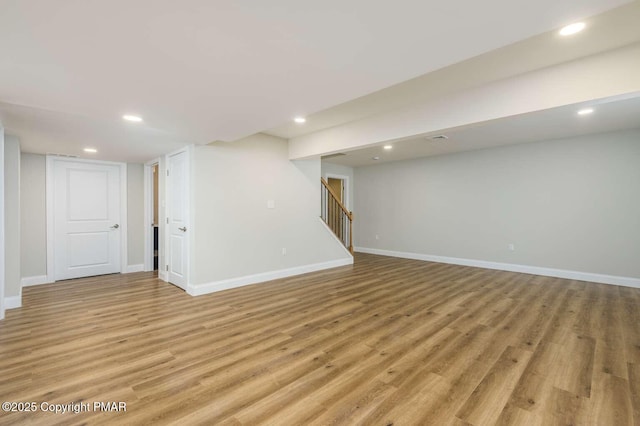 basement with light wood-type flooring