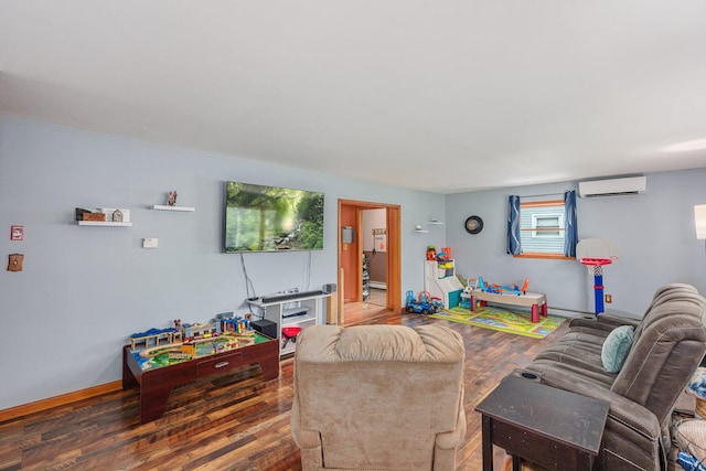 596 Chestnut St, East Stroudsburg, PA 18301 - living area featuring wood finished floors, a wall mounted air conditioner, baseboard heating, and baseboards