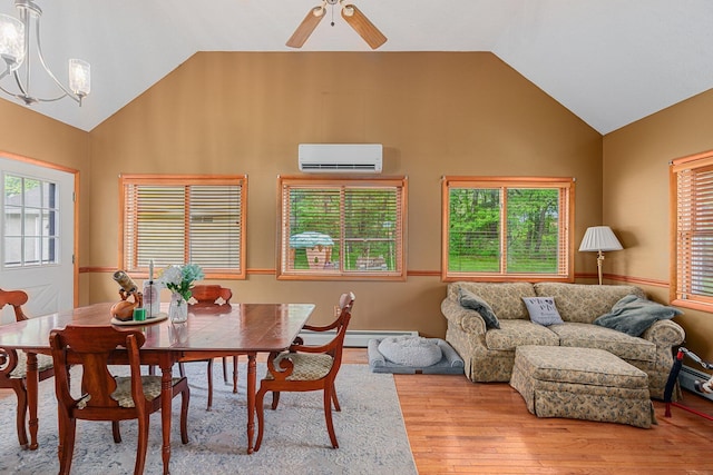 596 Chestnut St, East Stroudsburg, PA 18301 - dining space with a wall mounted AC, wood finished floors, ceiling fan, a baseboard radiator, and high vaulted ceiling
