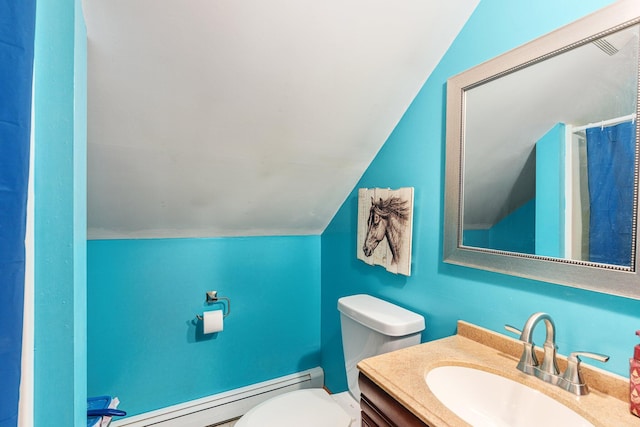 596 Chestnut St, East Stroudsburg, PA 18301 - full bathroom with a baseboard radiator, vaulted ceiling, toilet, and vanity