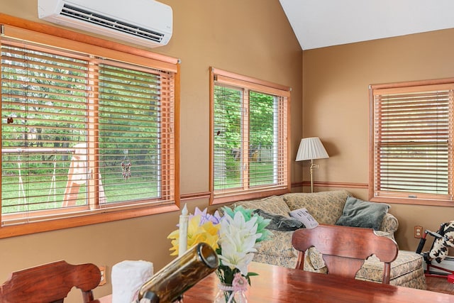 596 Chestnut St, East Stroudsburg, PA 18301 - living room with a wall unit AC and vaulted ceiling