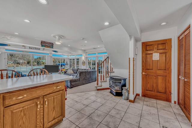 foyer with light tile patterned floors, stairs, a ceiling fan, and recessed lighting