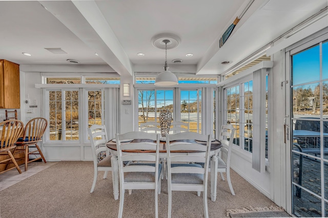 dining room featuring recessed lighting, light colored carpet, and visible vents