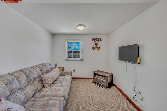 living room with carpet flooring and baseboards