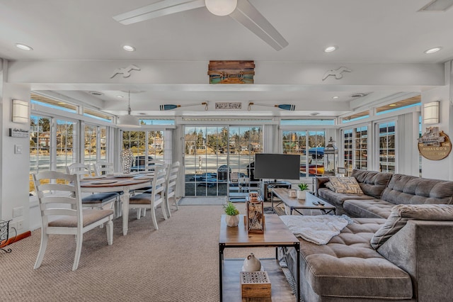 carpeted living room with recessed lighting and visible vents