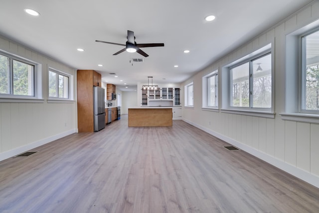 171 Knob Rd, Mount Pocono, PA 18344 - unfurnished living room featuring light wood finished floors, a wealth of natural light, and visible vents
