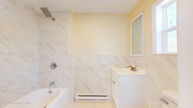 full bath featuring marble finish floor, tile walls, a baseboard radiator, toilet, and vanity