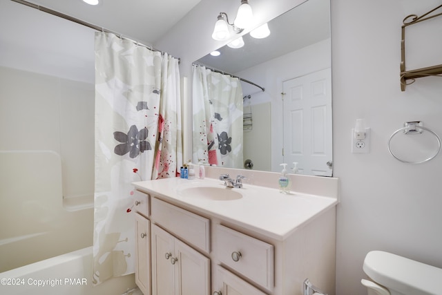 full bath featuring toilet, shower / bath combo, and vanity