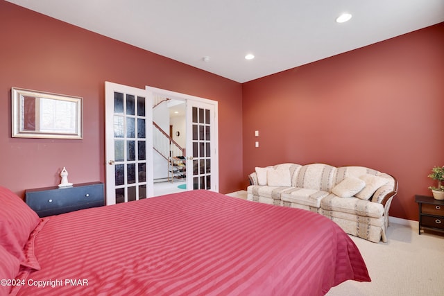 carpeted bedroom featuring baseboards, french doors, and recessed lighting