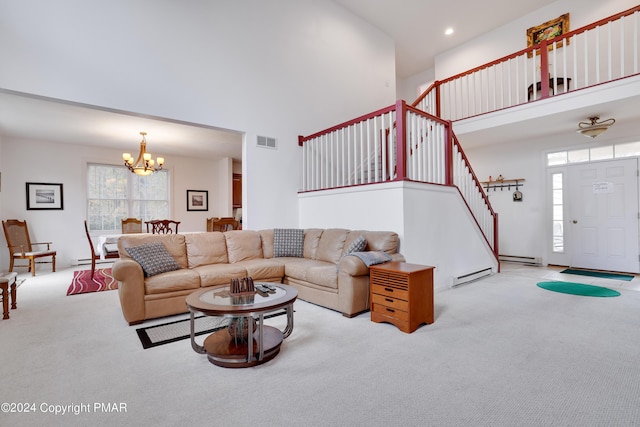 living area featuring stairs, a high ceiling, carpet, and visible vents