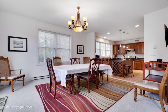 dining area with light carpet, a baseboard heating unit, a chandelier, and recessed lighting