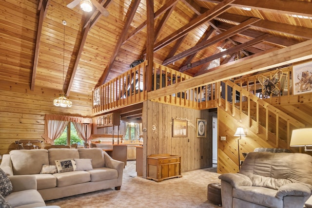 324 Hatchery Rd, Jim Thorpe, PA 18229 - carpeted living room featuring wooden walls, a wood ceiling with exposed beams, high vaulted ceiling, and a ceiling fan
