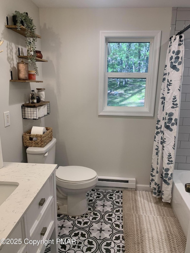 bathroom with a baseboard radiator, toilet, shower / bath combo, vanity, and tile patterned flooring