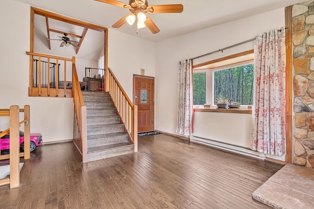 217 Coach Rd, Tobyhanna, PA 18466 - stairs with ceiling fan, wood finished floors, and a baseboard heating unit