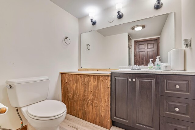 217 Coach Rd, Tobyhanna, PA 18466 - full bath with toilet, vanity, an enclosed shower, and wood finished floors