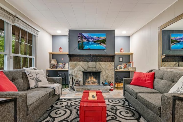 1005 Maple Dr, Pocono Lake, PA 18347 - living area featuring a stone fireplace