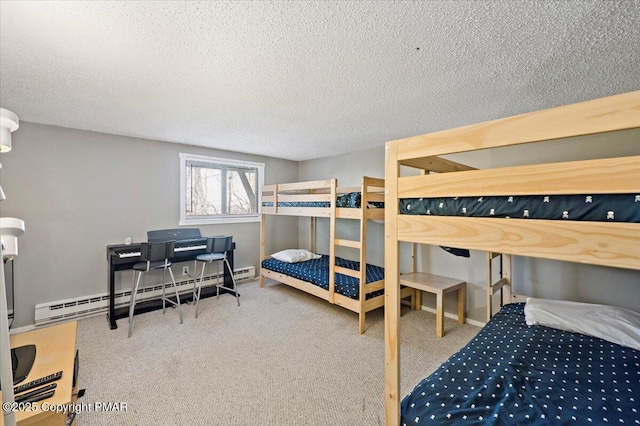 bedroom featuring a textured ceiling, baseboard heating, and carpet