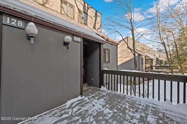 view of snow covered deck