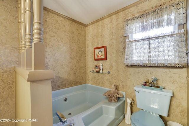 bathroom featuring toilet, wallpapered walls, ornamental molding, and a bath