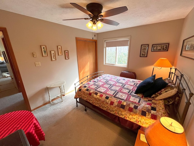 5 Cayuga Dr, Jim Thorpe, PA 18229 - bedroom with a closet, baseboards, ceiling fan, a textured ceiling, and carpet floors