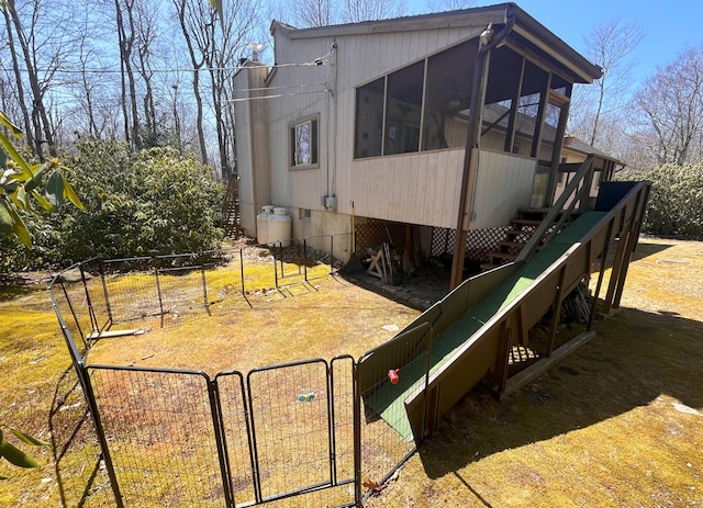 5 Cayuga Dr, Jim Thorpe, PA 18229 - carpeted bedroom featuring a textured ceiling, connected bathroom, and ceiling fan