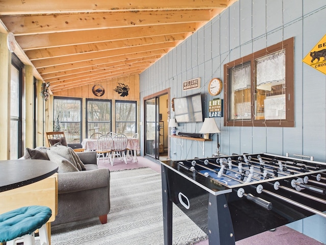 179 Choctaw Dr, Pocono Lake, PA 18347 - game room with a healthy amount of sunlight, wooden walls, vaulted ceiling with beams, and carpet floors