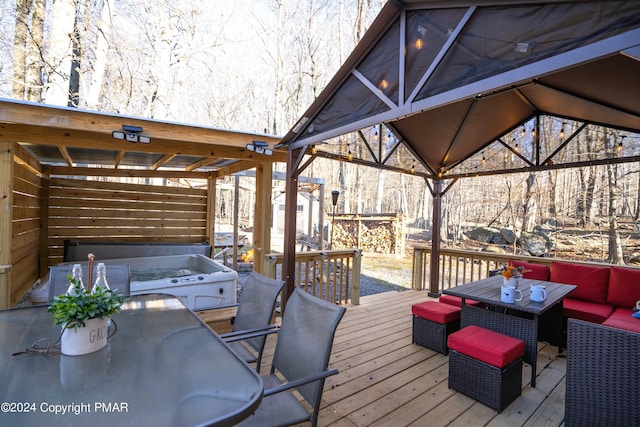 wooden terrace with an outdoor living space and outdoor dining area