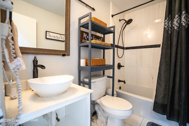 full bath featuring tile patterned flooring, shower / bath combination with curtain, toilet, and vanity