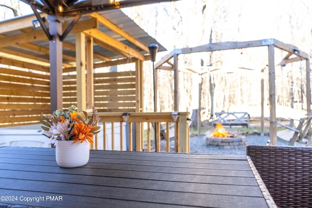 deck with an outdoor fire pit