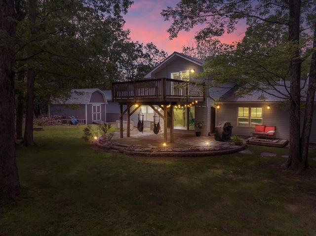 84 Deer View Dr, Jim Thorpe, PA 18229 - back of house featuring a storage unit, a deck, a yard, and a patio