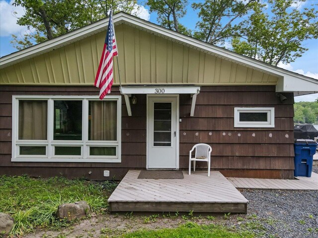 300 Indian Lake Trl, White Haven, PA 18661 - back of property featuring board and batten siding, crawl space, and a wooden deck
