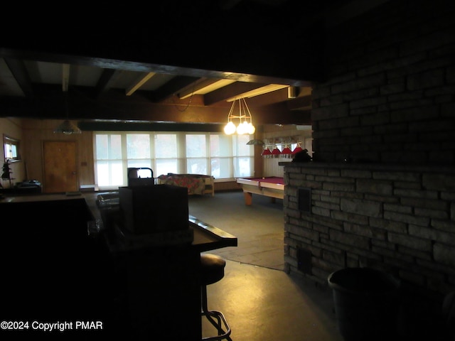 dining room featuring beamed ceiling