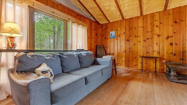 300 Indian Lake Trl, White Haven, PA 18661 - living area with vaulted ceiling, wood-type flooring, and wood walls