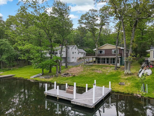 300 Indian Lake Trl, White Haven, PA 18661 - dock area featuring a water view, a lawn, and an outdoor fire pit