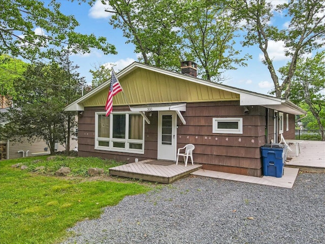 300 Indian Lake Trl, White Haven, PA 18661 - back of property featuring a wooden deck and a chimney