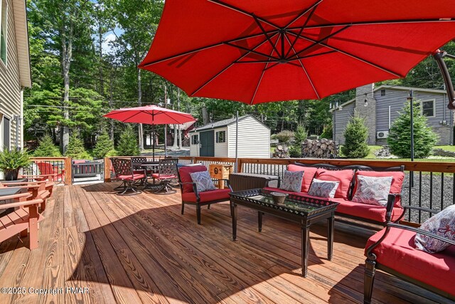 deck with an outdoor living space