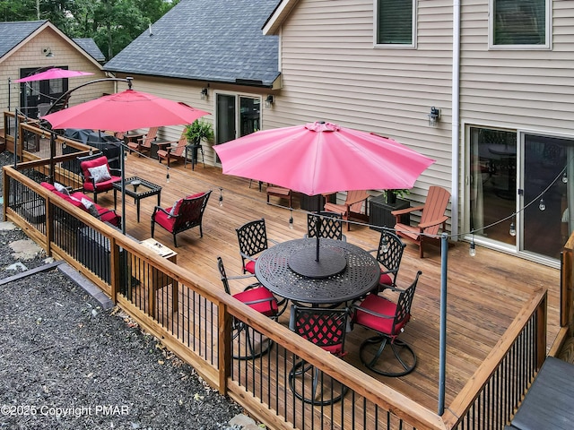 deck featuring an outdoor hangout area and outdoor dining area