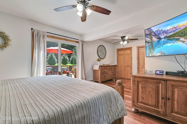 bedroom featuring ceiling fan, light wood-type flooring, and access to outside