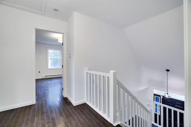 9436 Juniper Dr, Tobyhanna, PA 18466 - hall featuring an upstairs landing, a baseboard heating unit, and hardwood / wood-style floors