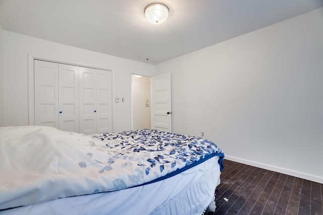 9436 Juniper Dr, Tobyhanna, PA 18466 - bedroom featuring dark wood finished floors and a closet