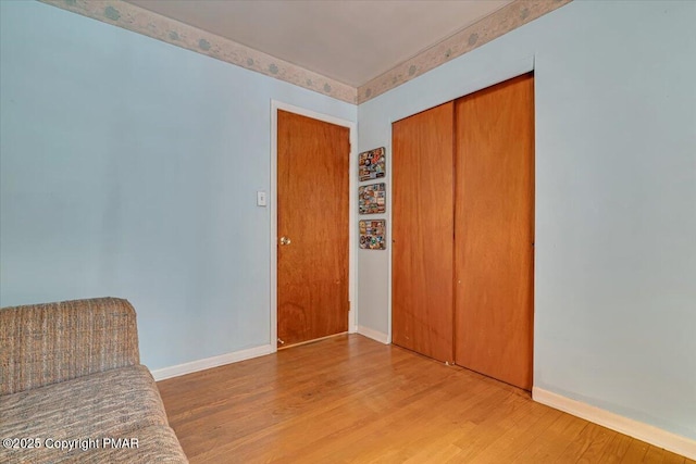 unfurnished room featuring wood-type flooring