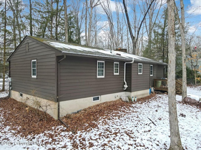 view of snow covered property